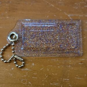 COACH Poppy clear multicolor sparkle hangtag keychain
